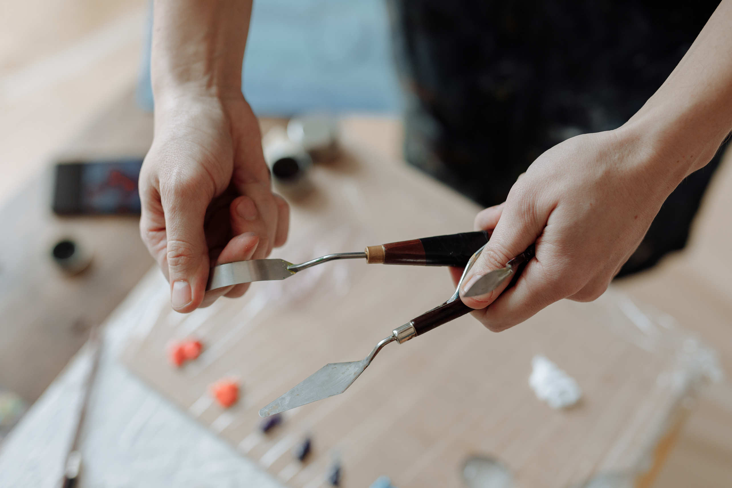 A Person Holding a Palette Knife